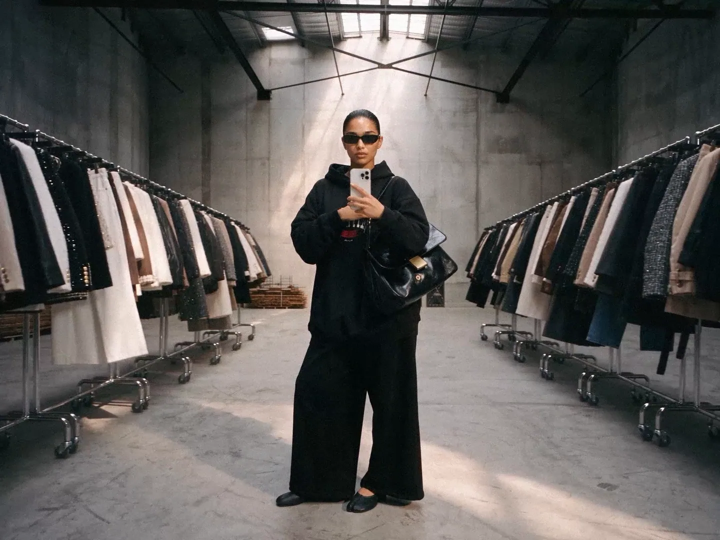 Trinity, a NeoCarter AI model, styled through rapid wardrobe changes inside a fashion warehouse